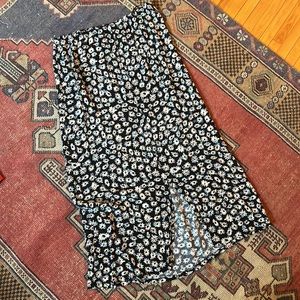 Free People slinky Daisy print slip skirt button front size L